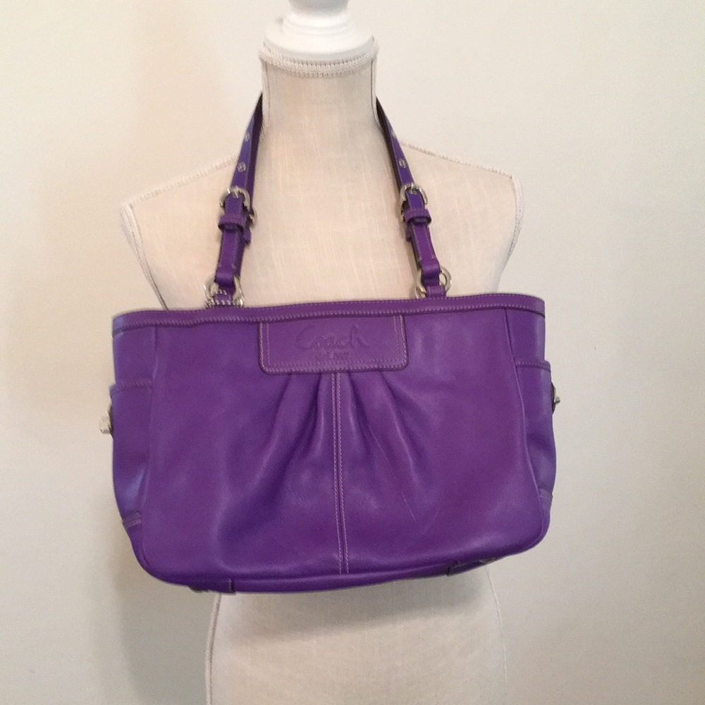 New purple leather Coach bag.
